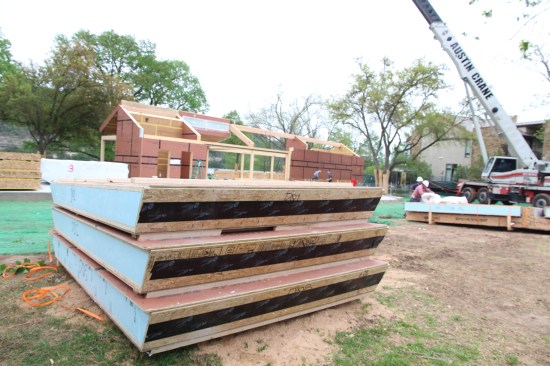 Roof panels have a rubber gasket to seal where panels meet at the ridge.