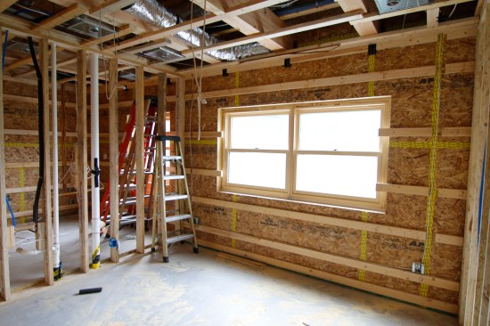 All ductwork, plumbing and electrical is routed within strapped walls and interior framing cavities, keeping everything inside the envelope and minimizing penetrations.
