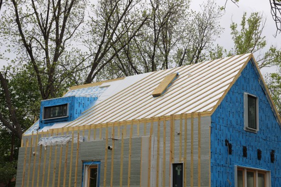 Four inches of polyiso board on the walls and 8 inches of polyiso on the roof complete the envelope.