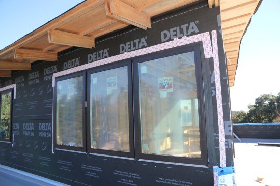 Windows need to be sealed with a low-expanding foam from the inside and taped on the outside.