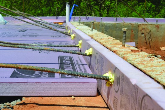 Two inches of insulation at the slab edge and under the slab shaved 8,000 Btu/hour off the heating load of this Atlanta slab on grade.
