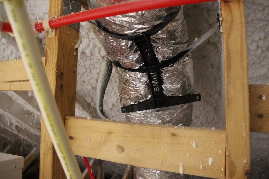 Besides enforcing a smooth bend, the Smart Elbow helps to hold ducts away from obstructions.
