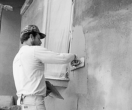 A 1/8-in.-thick finish coat is applied with a trowel.