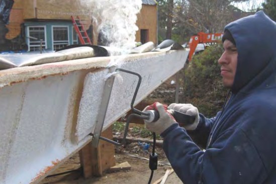 Mistakes and changes can force the crew to alter panels in the field. After trimming panels to size with a circular saw, an electric hot knife must be used to neatly remove the foam so there will be room for a block spline.