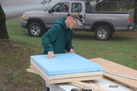 He stacks up the insulation ...