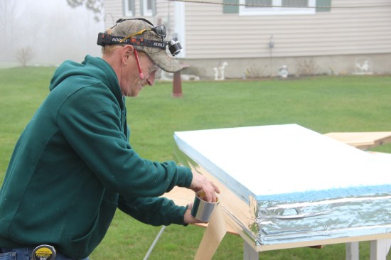 ... secures it with foil tape ...