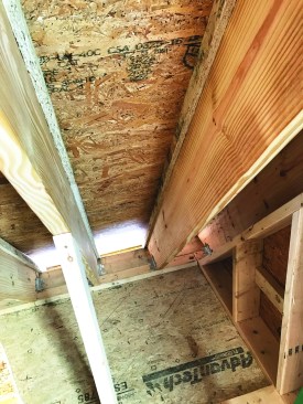 The author decided to ensure the durability of that portion of the roof by building a robust venting system. He stapled 1 1/2-inch furring strips to the top edge of each rafter in every bay.