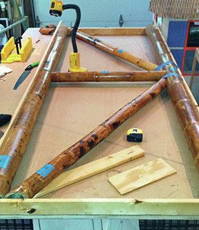 I needed to learn some special joinery and lashing techniques to build the railing, and found that the special bamboo saw that I acquired (from japanwoodworker.com) was instrumental in cutting the poles cleanly without damage to the cut edge. To make the job easier, I built a flat table with a frame set to the exact size of the railing. 