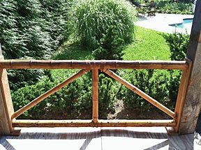 I traced the ends of the top and bottom rails onto mahogany verticals and cut out the shape to allow the rails to slip into the verticals. Then I screwed the verticals into the posts. The railings were finished with three coats of Sikkens Cetol marine varnish.