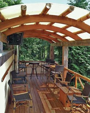 The original plan was to use metal roofing, but we learned that the panels could not be made to conform to the arch. Instead, a local shop (futurelineautotops.com) fabricated the roof using Stamoid vinyl-coated polyester fabric, which is often used for auto and marine upholstery.