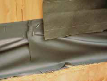 This through-wall flashing is properly tucked under the building paper, so that any water on the backup wall is directed onto the flashing. However, an overlap of at least 8 inches is recommended.