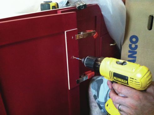 A jig makes it easier to locate and drill for handles.