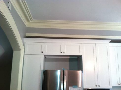 Correcting out-of-level conditions before ordering cabinets can minimize appearance problems at soffits and ceilings.