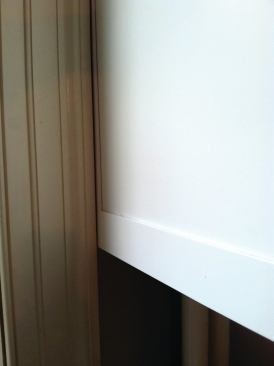 Built-up door or window trim can also cause problems. The cabinet door can’t be opened because it’s obstructed by the trim