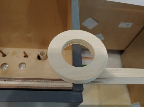 It turned out that the plans were incorrect and the end panel was an inch, not 1/4 inch, which resulted in misdrilled plumbing holes. A wood trim ring corrected for the error.