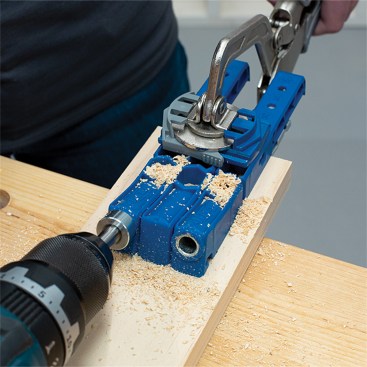 The author prefers to use a clamp to hold the jig in place.