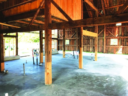 Inside the building, posts needed to be spliced for length, as well as to replace the deteriorated post ends with sound material.