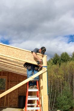 Rafters were attached at the wall plate with structural screws.