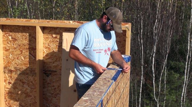 A layer of OSB taped at the seams formed the joint at the wall plate where the rafters would sit.