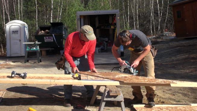 For a jig, two layers of OSB were cut to fit between the I-joist flanges; then another layer of OSB was screwed on at the correct angle to guide the circular saw.