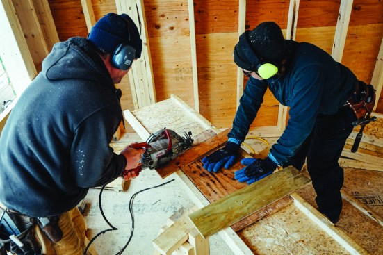 Jesper Kruse and carpenter Anna Heath made rafter plumb cuts using a site-built jig.