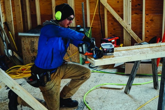 Carpenter Ryan Bielenda packed out each rafter web with plywood stiffeners.