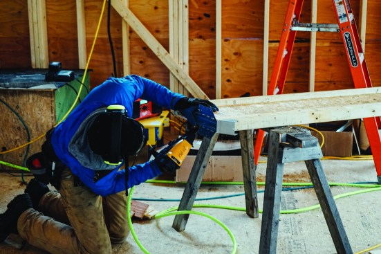Then he pre-applied Simpson adjustable wood I-joist hangers, which can be adjusted in the field to the necessary angle for a sloped or skewed connection.