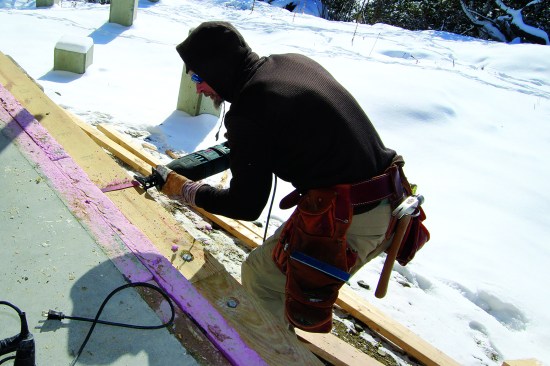 The foam was run proud. Once the slab was poured, it was cut flush.