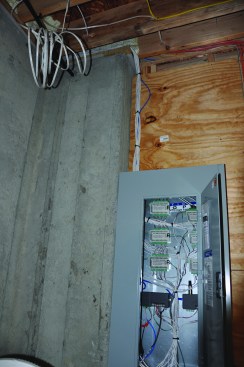 The circuit for each rail segment is wired to a panel in the basement.