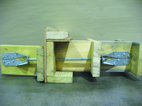 When house joists are perpendicular rather than parallel to the deck joists, solid blocking must first be installed between at least two joist bays, starting at the rim joist, then the tie must be mounted on the block furthest from the rim joist.