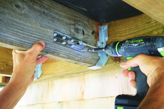 Fasten the tie to the joist with the supplied structural screws.