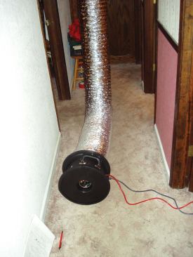 The Duct Blaster system consists of a calibrated "fan" that connects to the HVAC duct system, and a digital manometer that converts pressure readings into volumetric airflow in cubic feet per minute (cfm).