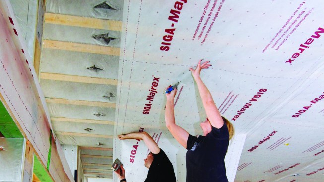 The author chose to use netting to contain the blown insulation, and then apply Majrex directional vapor control membrane as a control layer for air transport and diffusion of vapor, allowing the building to dry to the interior if needed.