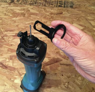 The router’s adjustable shoe doubles as a collet wrench.