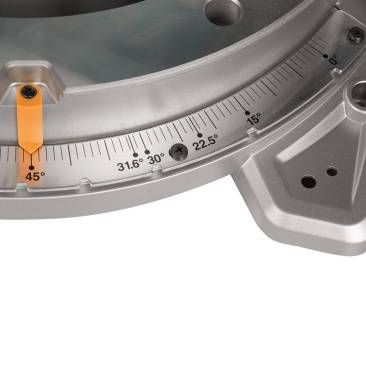 Preset detents and an adjustable plate. Adjusting the miter angle is a matter of loosening the screws and adjusting the plate. The saw miters 0° to 60° left and right, with positive stops at 0°, 15°, 22.5°, 31.6°, 45° and 60° (left or right).