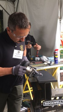Here, the new KFMPB 15-10 F chamfers a steel plate with more precision than a conventional router. This tool can chamfer up to 10mm, features a paddle switch and brake system. You can set the plates from 0° and 90°. What was cool to see with this model is the tool-free depth adjustment that can be adjusted in .1 steps. It has a power brake, overload protection, and soft start. Cost: $2800
