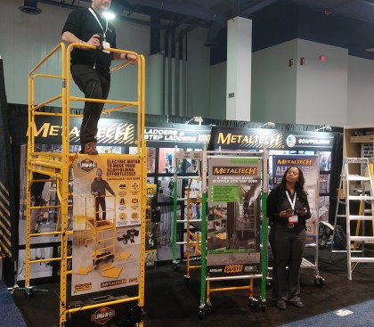 The Climb-N-Go gives standard baker scaffolding motorized mobility (at left),  and the fiberglass scaffold in the middle provides a safe platform for electrical work.