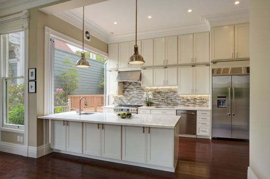 The newly enlarged kitchen features state-of-the-art Dacor appliances, ample cabinet space and a floor-to-ceiling folding glass wall from NanaWall Systems leading to the deck. But getting here wasn’t easy. Increasing the size required the removal of a wall that contained a chimney to the roof. This meant structural changes needed to be implemented with surgical precision, a task general contractor ORB Construction said was the most challenging aspect of the project. “The most intricate phase of the work involved bringing in the header, which would span the length of the kitchen,” recalled ORB owner Brendan O’Reilly. “It was a 14-foot-long, eight-by-eight steel I-beam, which we had to crane in through the window.”