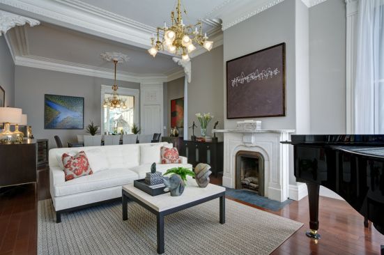The living room captures the essence of this remodel that preserved the home's history while still providing the comforts of the modern age.  
