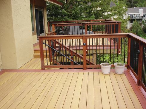 Contrasting composite-decking colors help differentiate the multiple levels of the deck. The decking was face-screwed to the framing. 