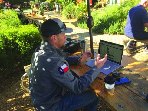 Multivista contractor John Whitton logs on to a project model over Wi-Fi at a coffee shop in Austin, Texas.