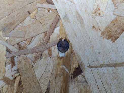 Flush-driven nail (right)