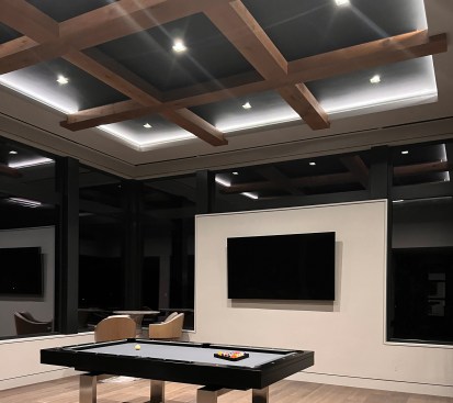 The finished rec room ceiling included coffers.