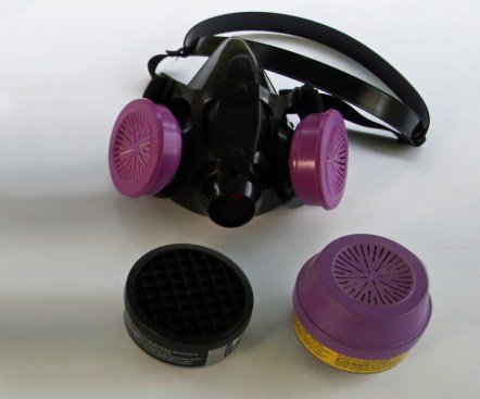 A reusable half-mask respirator (shown above) with the right color-coded filter (below) can protect workers from particles as well as hazardous vapors or gases.