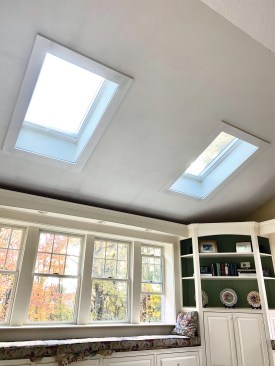 Once I was satisfied that the reveals were even, I nailed the trim kit to the ceiling framing with 2-inch-long 18-gauge nails.