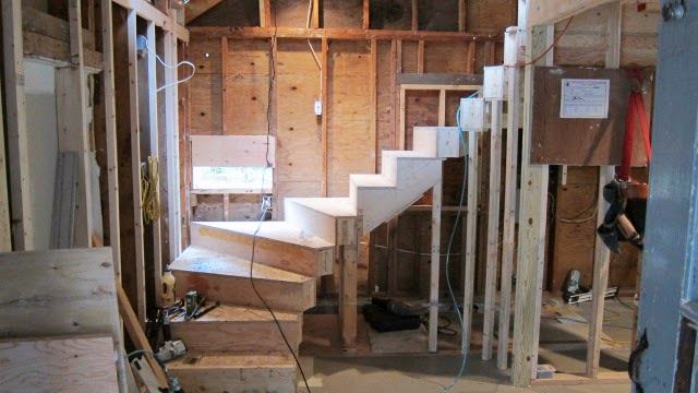 Lastly, the four boxes of the upper winder were installed; each box supported by temporary support legs on the wall side and 2x3 studs on the stair's open side.