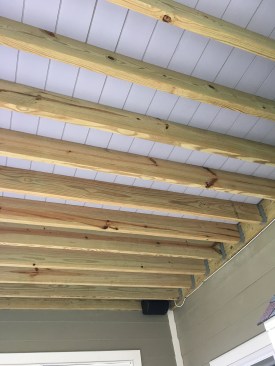 The installed decking also creates a bright ceiling for the space underneath.