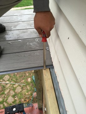 Before the fasteners are driven into the joists, a BoWrench (cepcotool.com) or even a flat-head screwdriver can be used to pry the decking in place, which compresses the gasket.