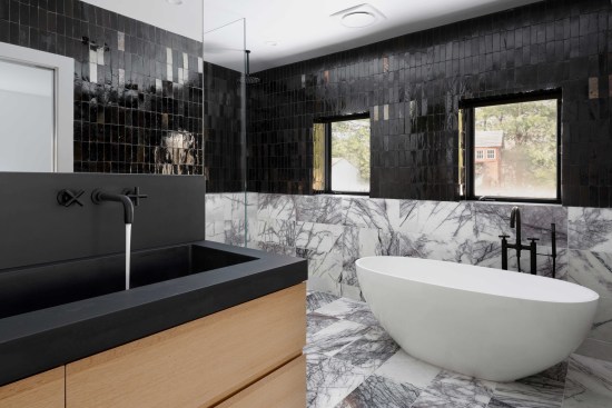 On this high-end bathroom gut remodel (photo above), the author said, "I wish this job had been cost-plus. This job was early on in my career and it took hundreds of hours to complete. Cost-plus shines on jobs like this where we have a lot of high-end details and fixtures that we had never done before. Instead of relying on my guess for how long it should take, we could have simply been tracking our hours and billing for them."