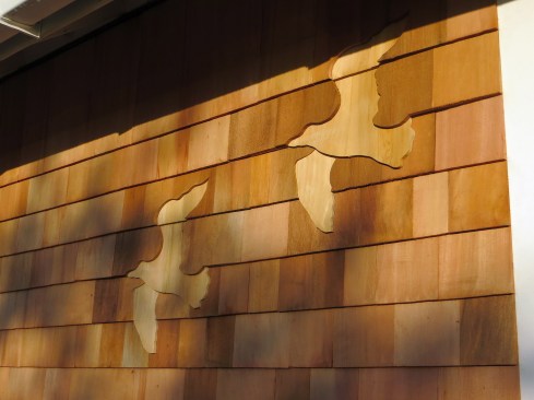 Shingles in Flight The two birds were made at the proper exposure and went in quickly and easily. The final two courses above the birds will be installed soon.